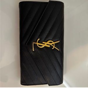 Saint Laurent Large YSL Grain de Poure leather flap wallet. Black. Authentic